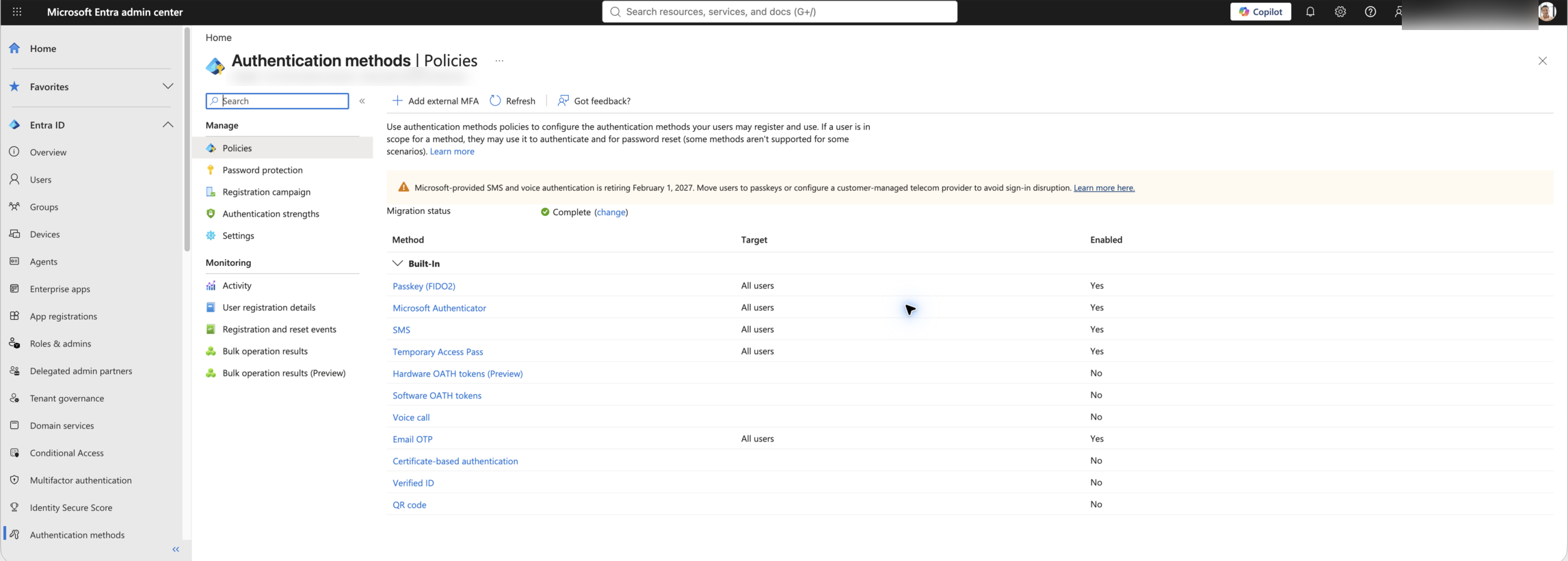 Live Microsoft Entra Authentication methods Policies screen showing Passkey (FIDO2) enabled for all users.